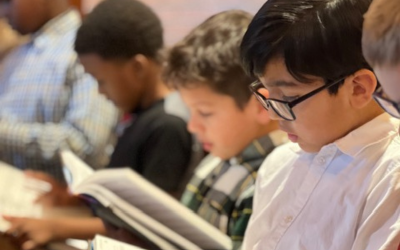 Children in a choir reading music at Redeemer Lutheran School